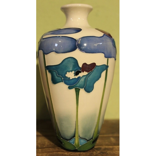 81 - A Moorcroft pottery vase, Blue Heaven design, various impressed & painted marks to base, 16cm high i... 