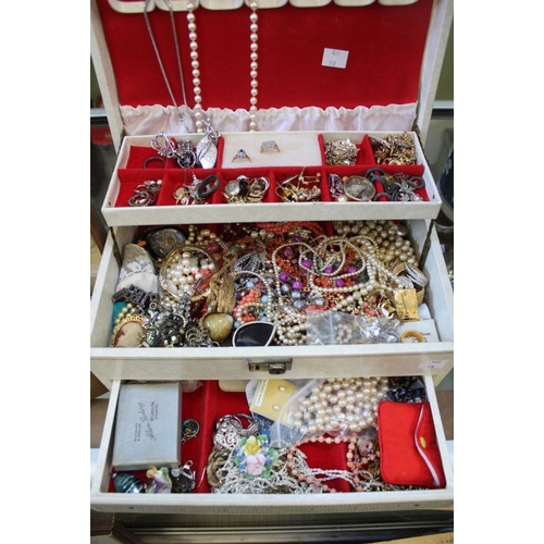 116 - A substantial collection of costume jewellery over two boxes