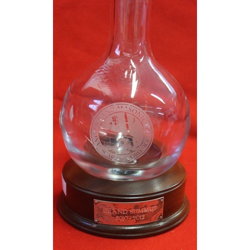 117 - A silver collar glass decanter with stopper, engraved 