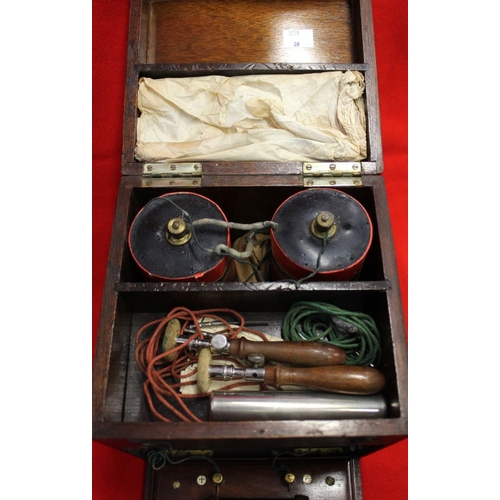 169 - A mahogany cased electric therapy machine, c.1910