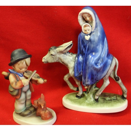 205 - Three Hummel by Gobel of Germany figurines to include 'Madonna and Child seated on a donkey' 18.5cm ... 