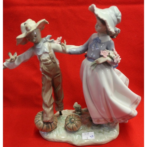 209 - Two Lladro ceramic figure groups, scarecrow and snowman, tallest 24cm high (2)