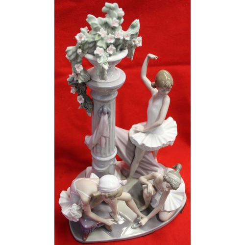 219 - A large Lladro porcelain ballerina group with central jardinière column 43cm high