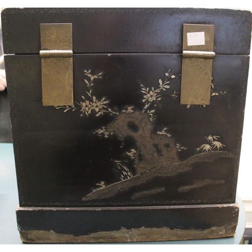 220 - An Oriental ebonised table cabinet, mother of pearl inlaid figurative decoration, with metal fitting... 