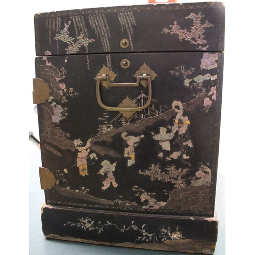 220 - An Oriental ebonised table cabinet, mother of pearl inlaid figurative decoration, with metal fitting... 