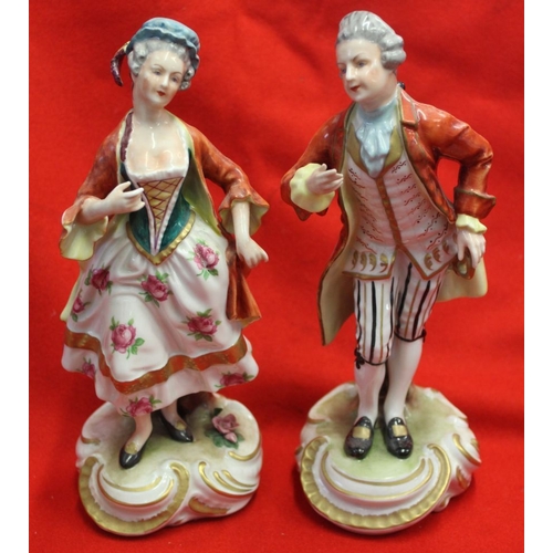 227 - A pair of Continental ceramic figurines in 18th century costume, together with three 19th century St... 