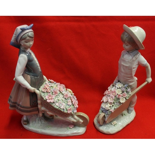 245 - Five Lladro ceramic figures includes two with wheelbarrows of flowers (5)