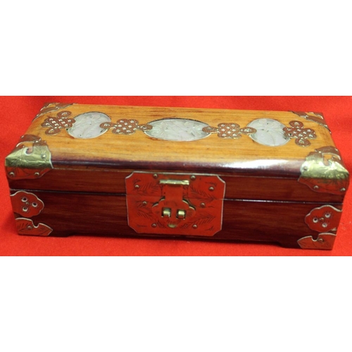 251 - A Chinese jewellery box, with brass and pierced stone decoration, fabric lined, 25cm wide