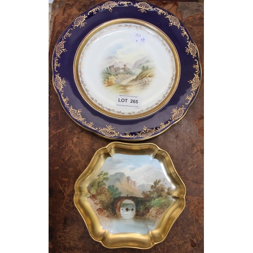 265 - A Coalport porcelain plate, gilded cobalt blue rim, hand painted scene 