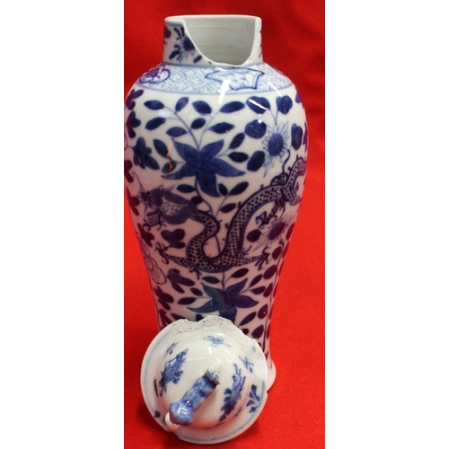 274 - Two Chinese vases, blue & white hand painted, one with dragon decoration, both with covers & both be... 