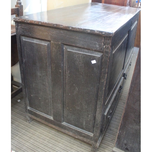 316 - An 18th century oak mule chest, with hinged cover over twin panel front with two drawers to base, 14... 