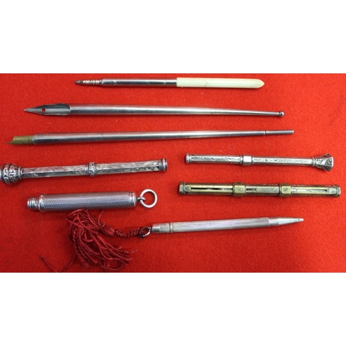 341 - A collection of various propelling pencils and dip pens includes silver and carved bone