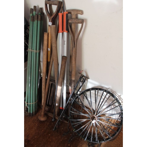 359 - A selection of garden tools together with hanging baskets