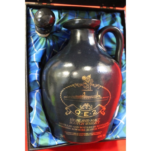 55 - A flagon of Highland Malt Scotch Whisky, purchased on the QE2, distilled and bottled by Morrison Bow... 