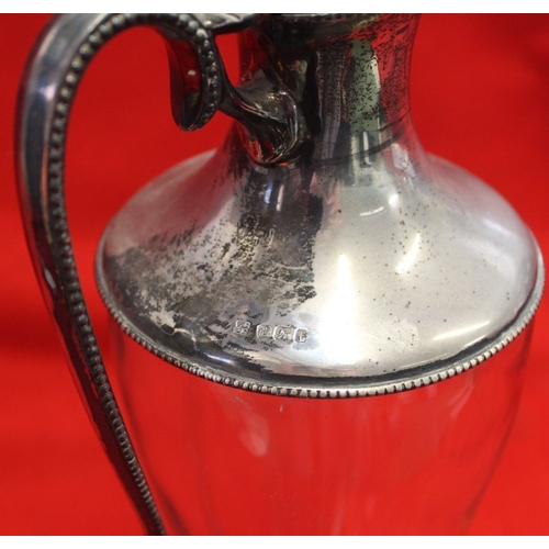 627 - A Victorian silver mounted glass claret jug, tapering plain glass form, with hinged cover, Sheffield... 