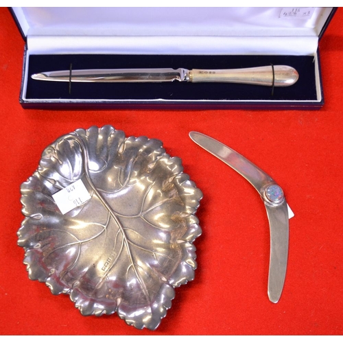 13 - An embossed silver dish in the form of a leaf, Birmingham 1972, 74g, together with a silver handled ... 