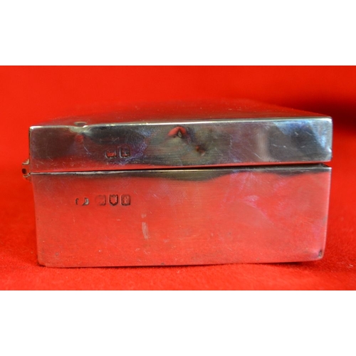 14 - Two hallmarked silver cigarette boxes, both monogrammed, gross weight 598g