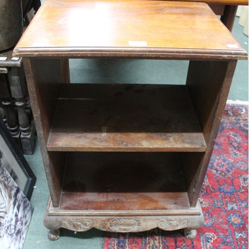 263 - A mahogany open bookcase with carved base with scroll feet, 50cm wide