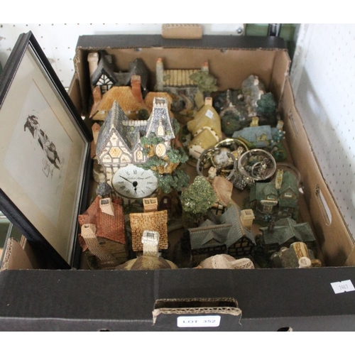 352 - A box containing miniature cottages, costume jewellery watches & a framed print