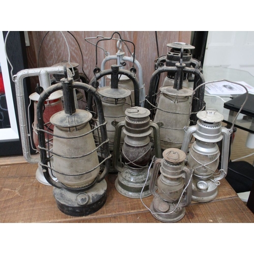 437 - A collection of ten various Hurricane lamps