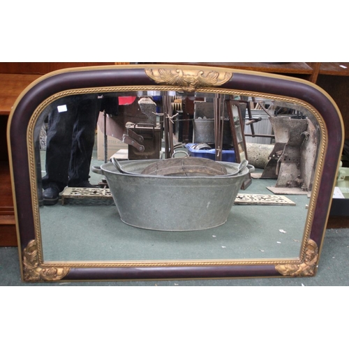 443 - A parcel gilt over mantel mirror, with a bevel plate size 58cm x 89cm