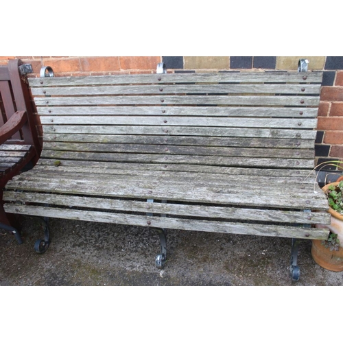 466 - A wrought iron & wooden slat garden bench