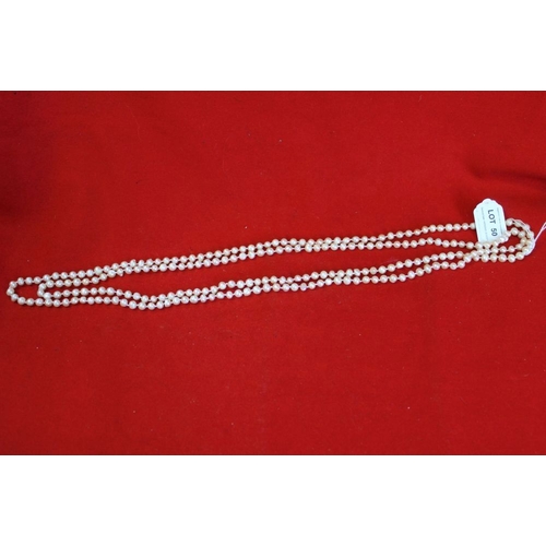 50 - A cultured pearl single long strand necklace, doubled 97cm