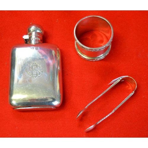 6 - An Edwardian silver hip flask, Sheffield 1906, monogrammed, together with a silver napkin ring, and ... 