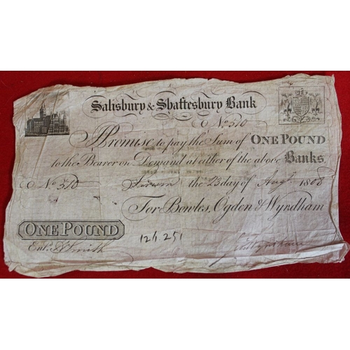 62 - A 1808 £1 bank note of the Salisbury & Shaftesbury Bank together with an Isle of Man £5 note no M969... 