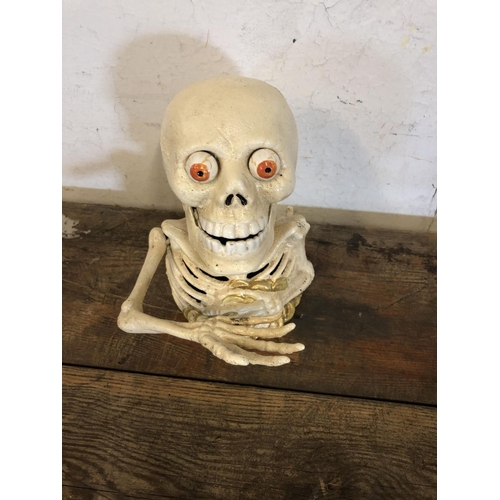 6 - Cast iron skeleton money box