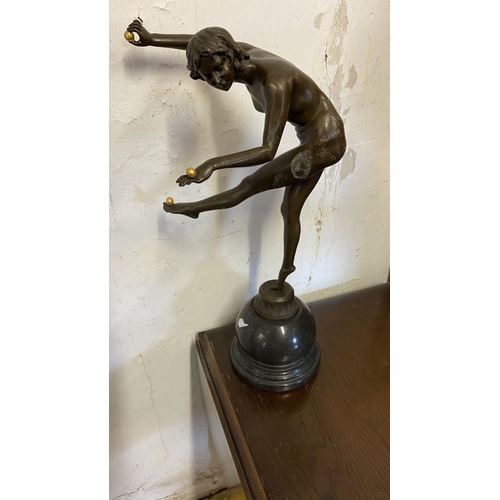 56 - Bronze study girl balancing