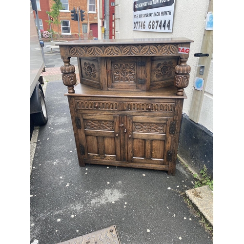 1 - Solid carved oak court cabinet