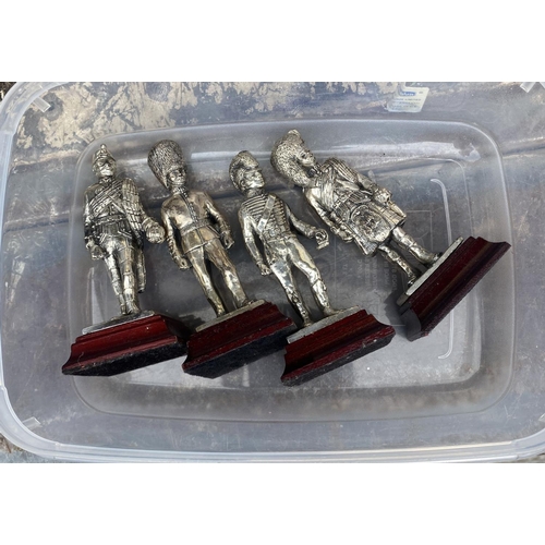 59 - 4 silver plated soldier figures