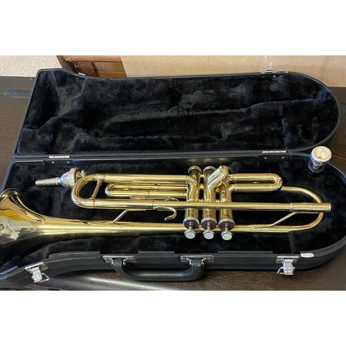 132 - Cased trumpet