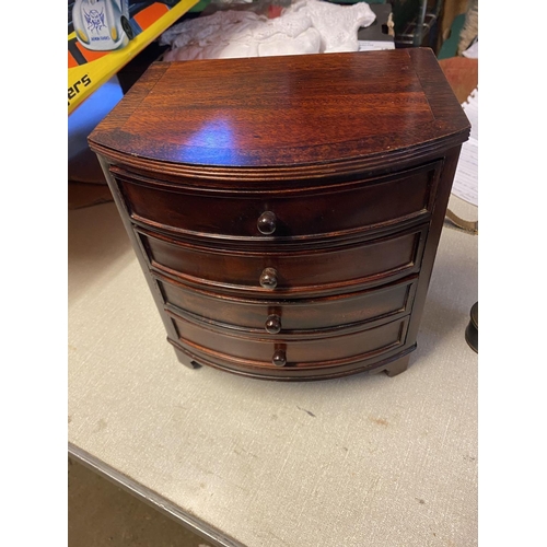 487 - Miniature bow front chest of 4 drawers