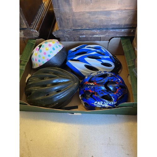 560 - 4 bike helmets