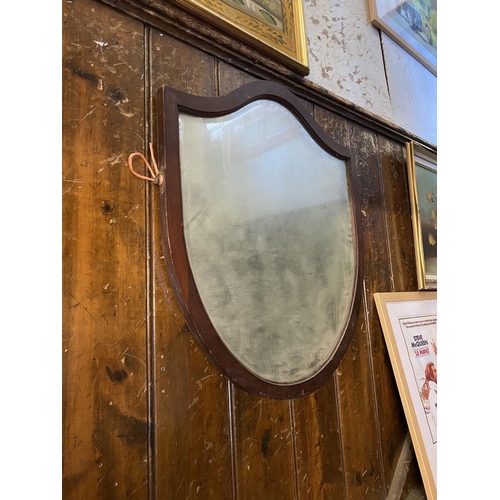 592 - Mahogany framed sheild shape mirror