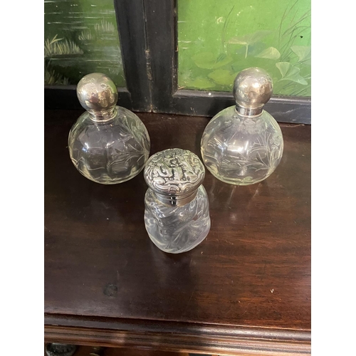 622 - 3 silver top scent bottles,1 as found