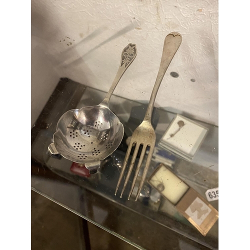 627 - Silver hallmarked tea strainer & fork