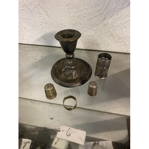 633 - Silver candlestick thimble etc