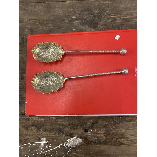 669 - Pair of silver hallmarked berry spoons