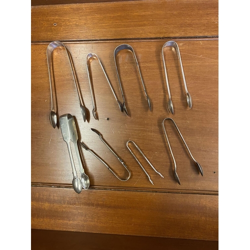 708 - 8 pairs silver hallmarked sugar tongs