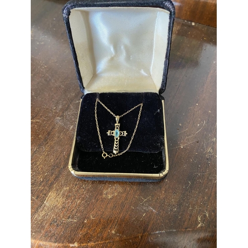 721 - 9ct gold Cross & chain