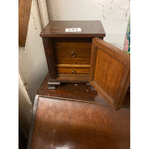 141 - Antique desk top cabionet