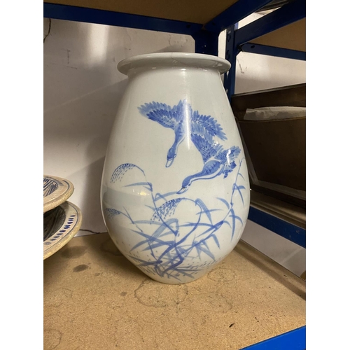 36 - Oriental blue & white vase