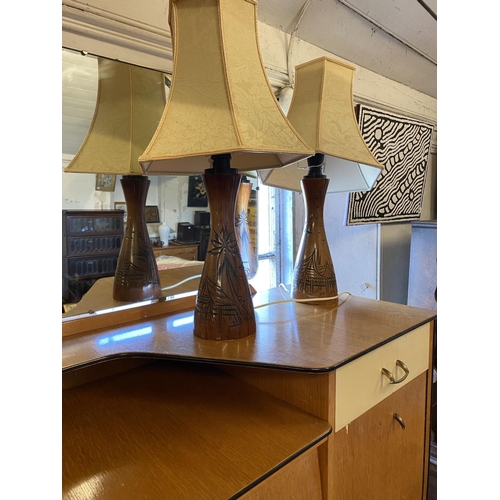 97 - Pair teak lamps