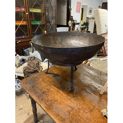 877 - Large riveted iron fire pit on stand