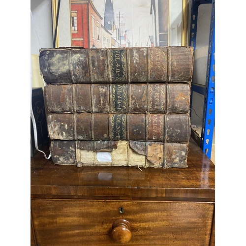 8 - 4 large leather bound books