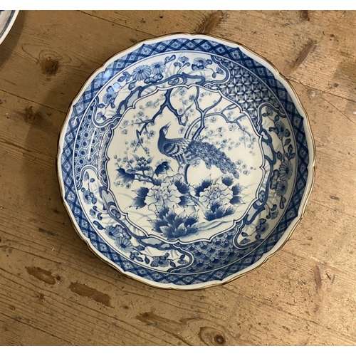 4 - Large oriental blue & white wall plate