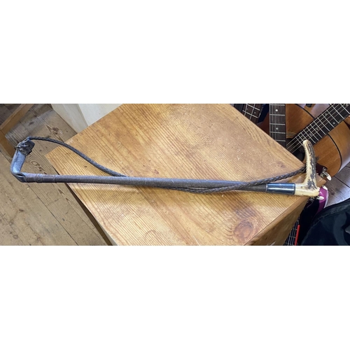 57 - Silver collard riding crop